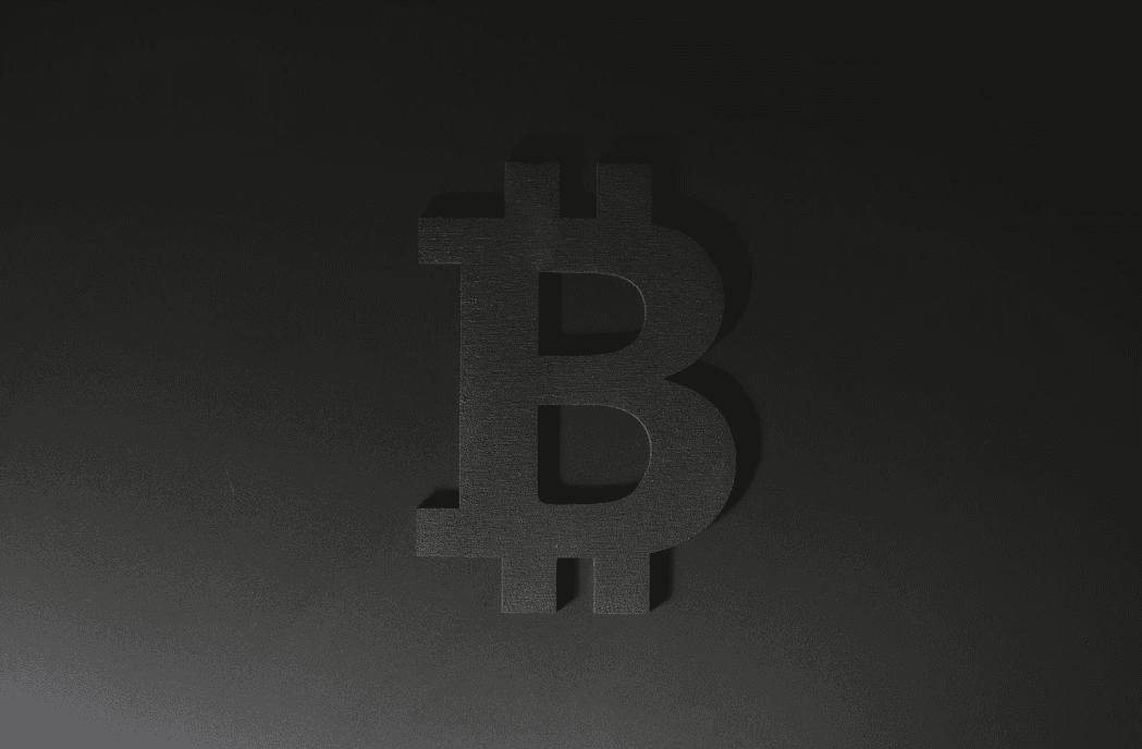 Bitcoin Holds $77K as Powell Faces His Final FOMC